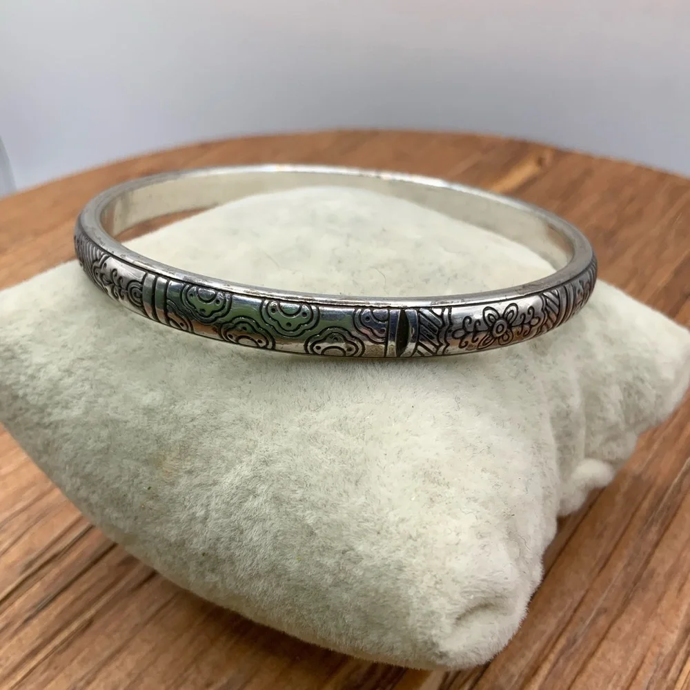 Brighton Silver-Tone Floral and Love Pattern Engraved Bangle Bracelet